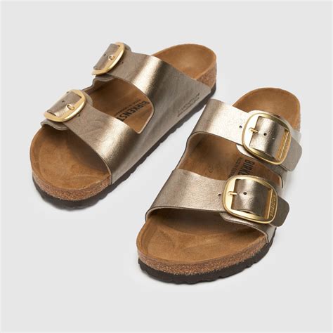 birkenstock sandals gold buckle.